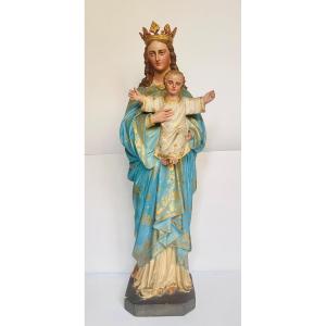 Crowned Virgin Holding The Infant Jesus. 